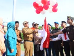 Kapolres Lhokseumawe Hadiri Apel Gabungan dan Lounching Pembagian 10 Juta Bendera Merah Putih