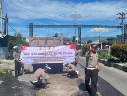 Satlantas Polres Bener Meriah Tambal Jalan Berlubang Demi Tekan Angka Kecelakaan Dalam Rangka Hari Bhayangkara ke-79