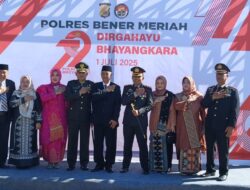 Dandim 0119/BM Didampingi Ketua Persit KCK Cab XXV Hadiri Upacara Hari Bhayangkara Ke-79