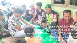 Babinsa Koramil 08/Silih Nara Laksanakan Komsos di Kampung Paya Beke, Ajak Warga Waspadai Cuaca Ekstrem